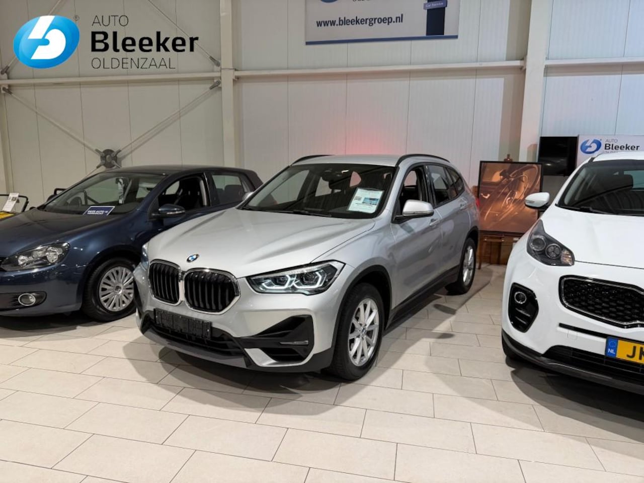 BMW X1 - SDRIVE18I Advantage Airco Navi Trekhaak LED Stoel verwarmd PDC. - AutoWereld.nl