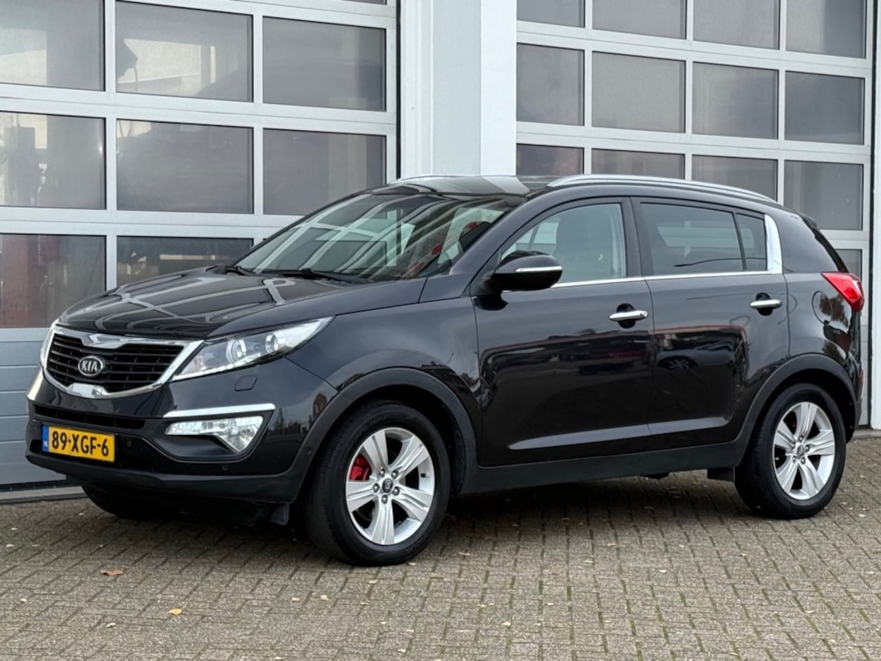 Kia Sportage - 1.6 GDI 135PK Super Pack Navi Camera Trekhaak - AutoWereld.nl