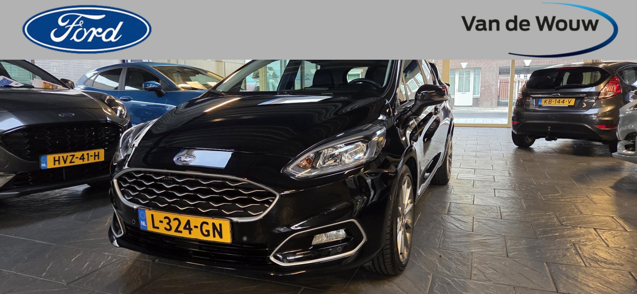 Ford Fiesta - 1.0 EcoBoost Hybrid Vignale Lederen bekleding-125pk-addaptieve cruise-winterpack - AutoWereld.nl