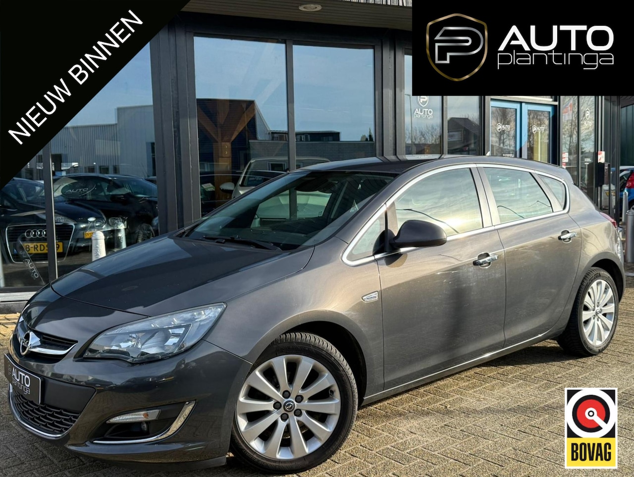 Opel Astra - 1.4 Turbo Cosmo 140PK | AUTOMAAT | NL AUTO | Stoelverwarming | Navigatie | Climate Control - AutoWereld.nl