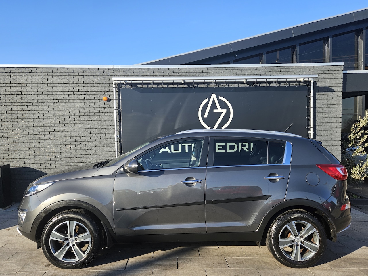 Kia Sportage - 1.6 GDI X-ecutive Plus Pack *AC*Navi - AutoWereld.nl
