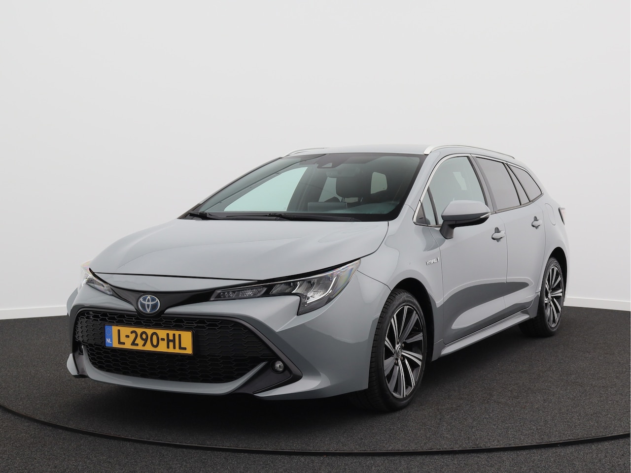 Toyota Corolla Touring Sports - 1.8 Hybrid Business Plus/ lage km/ leder/ zeer mooi! - AutoWereld.nl