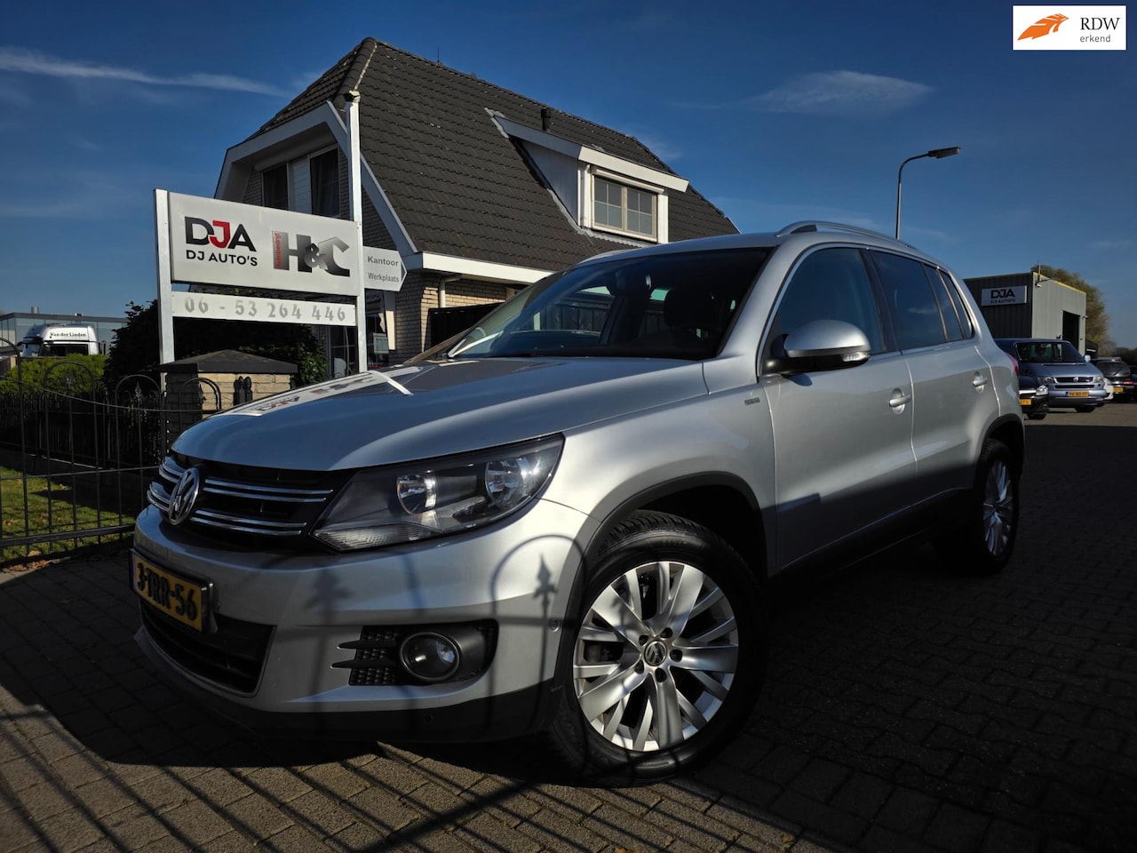 Volkswagen Tiguan - 1.4 TSI Sport&Style 4Motion - AutoWereld.nl