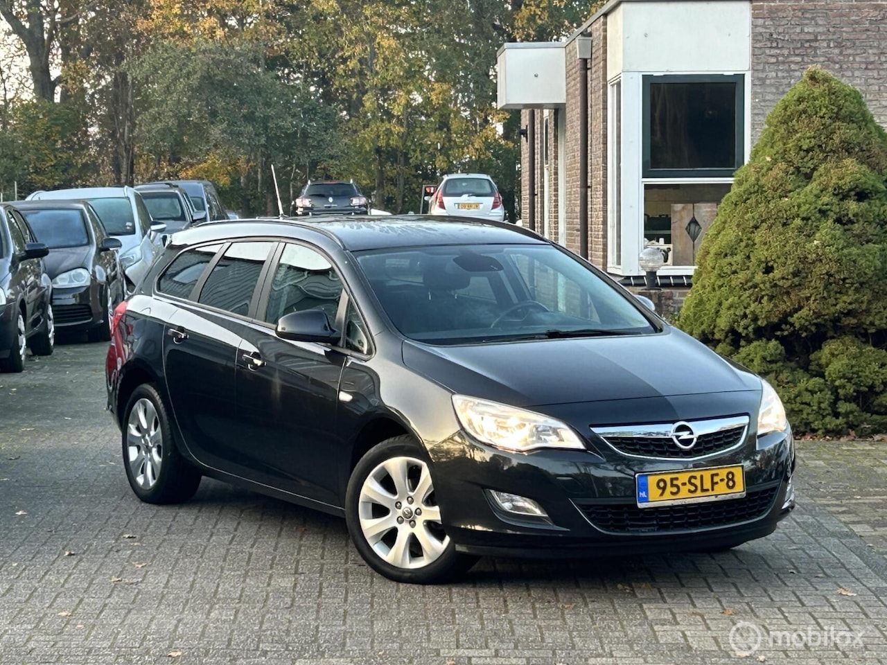 Opel Astra Sports Tourer - 1.4 Turbo Sport | Clima | Trekhaak | - AutoWereld.nl