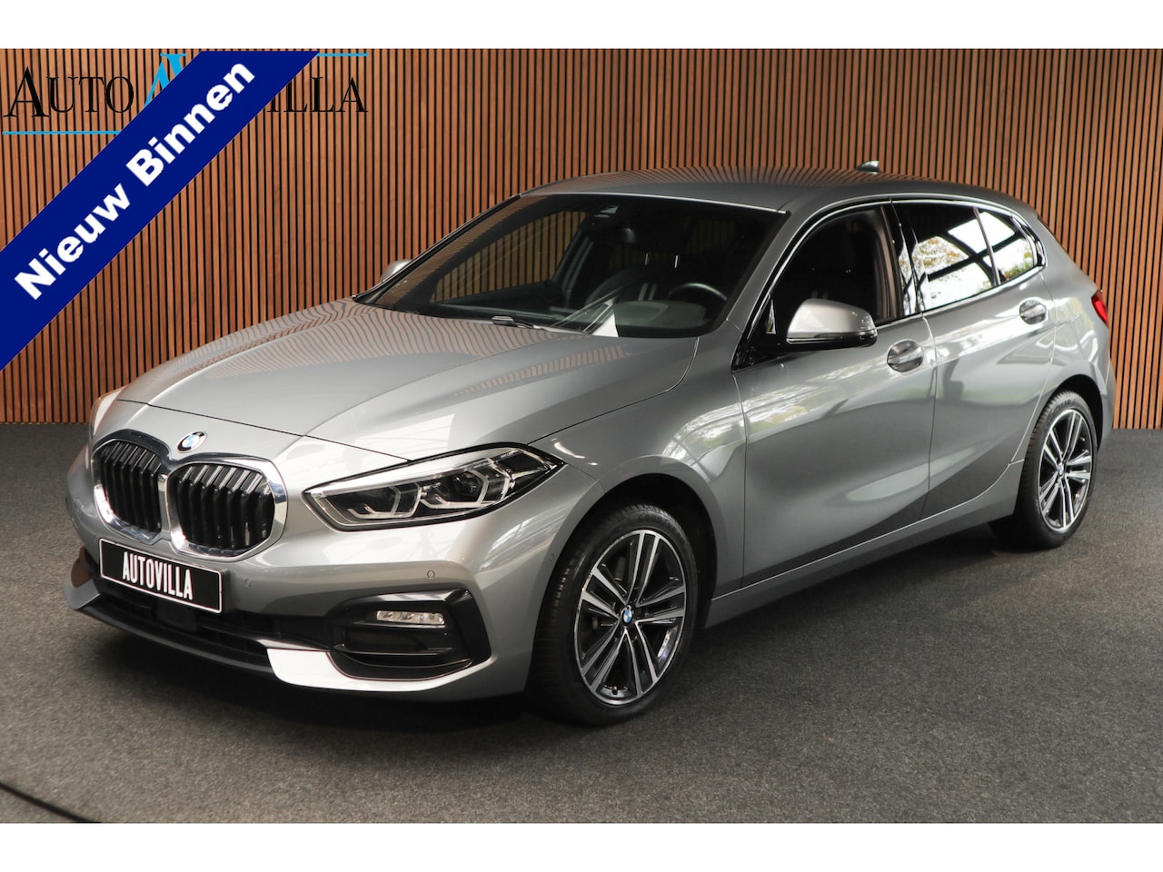 BMW 1-serie - 118i Sport-line Aut. Leer Navi ACC Camera PDC Climate Zwarte hemelbekleding LM velgen BTW - AutoWereld.nl
