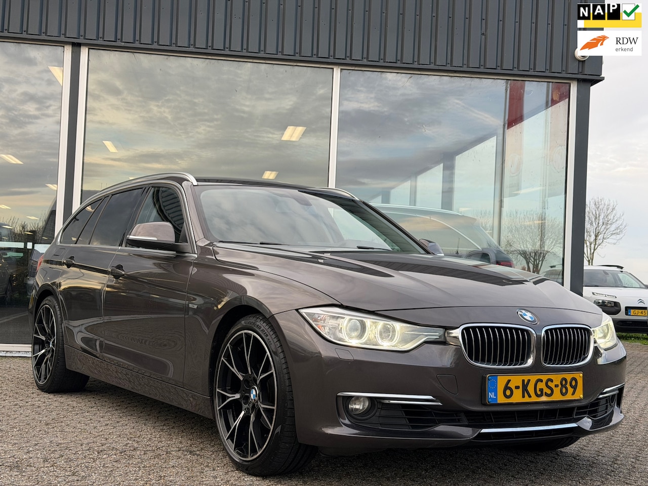 BMW 3-serie Touring - 320i Upgrade Luxury AUTOMAAT/LED/LEER - AutoWereld.nl