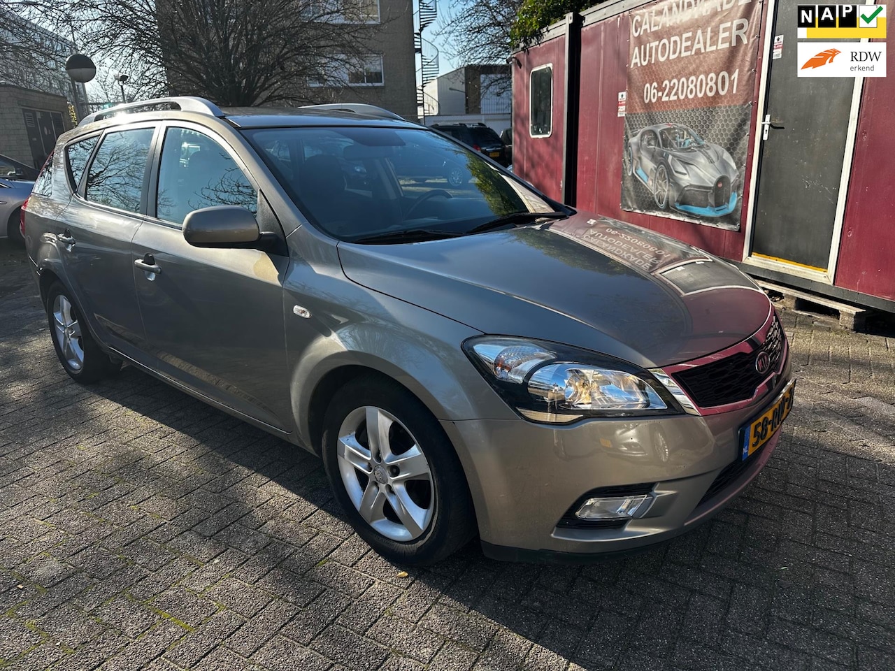 Kia Cee'd Sporty Wagon - 1.4 CVVT X-ecutive 1.4 CVVT X-ecutive, navi, NW ketting - AutoWereld.nl