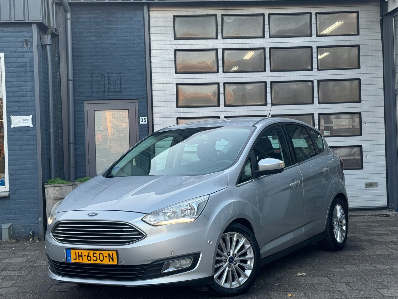 Ford C-Max - 1.0 Titanium | Clima | Navi | PDC V+A | N.A.P - AutoWereld.nl