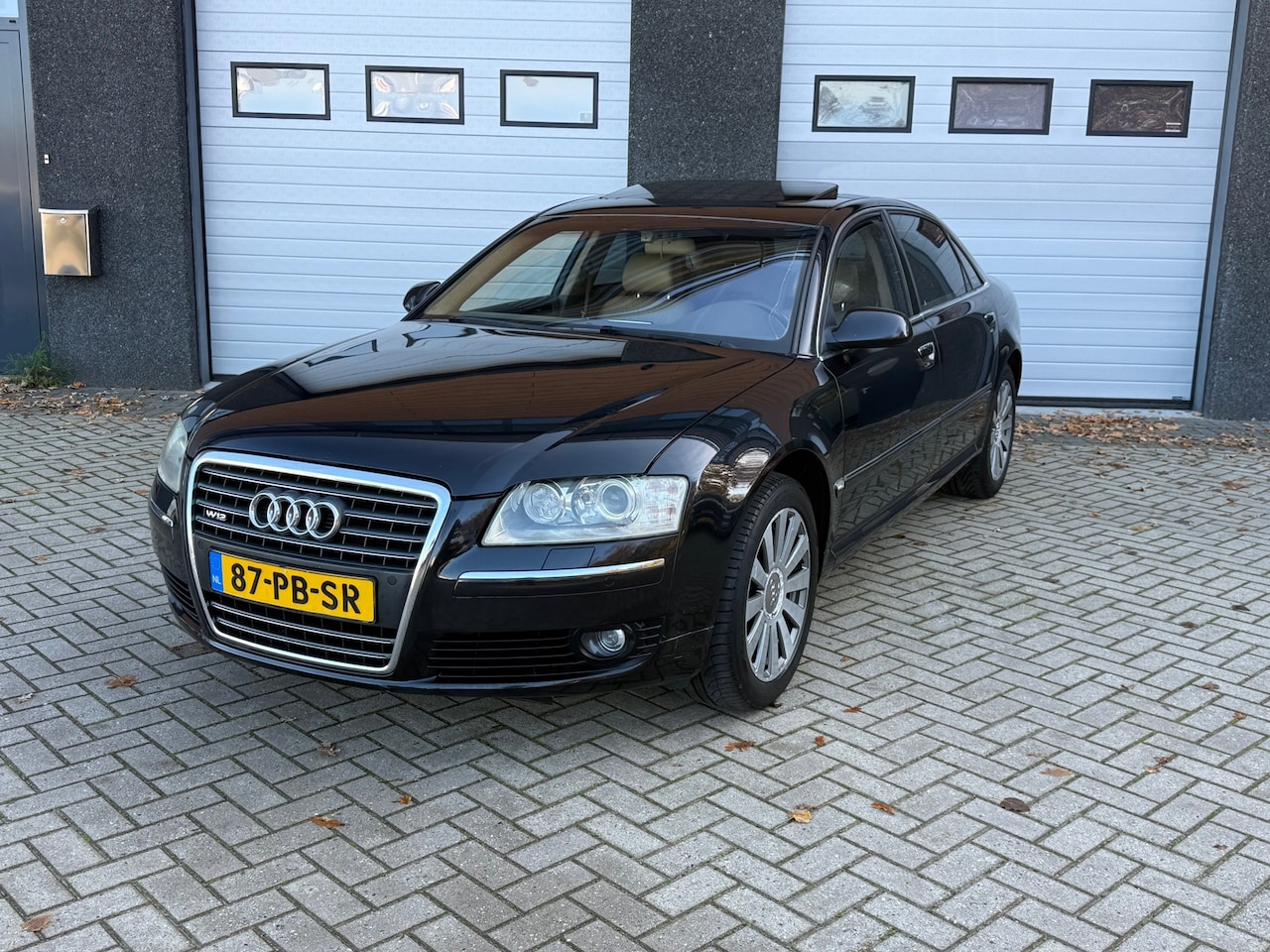 Audi A8 - 6.0 W12 quattro Lang Pro Line ORG. NL/MASSAGE/DAK/KEYLESS - AutoWereld.nl