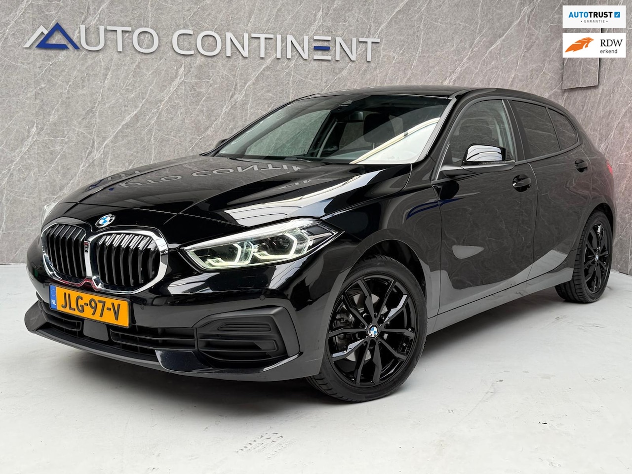BMW 1-serie - 116d High Executive / Nwe Distr. Ketting - AutoWereld.nl