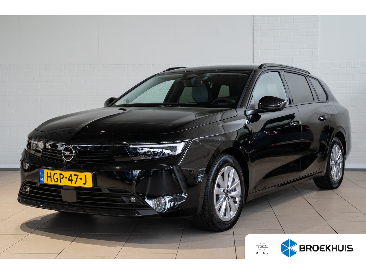 Opel Astra Sports Tourer - 1.2 Turbo 110PK Business Edition | Stoel & Stuurverwarming | Comfort Stoelen | Navigatie | - AutoWereld.nl