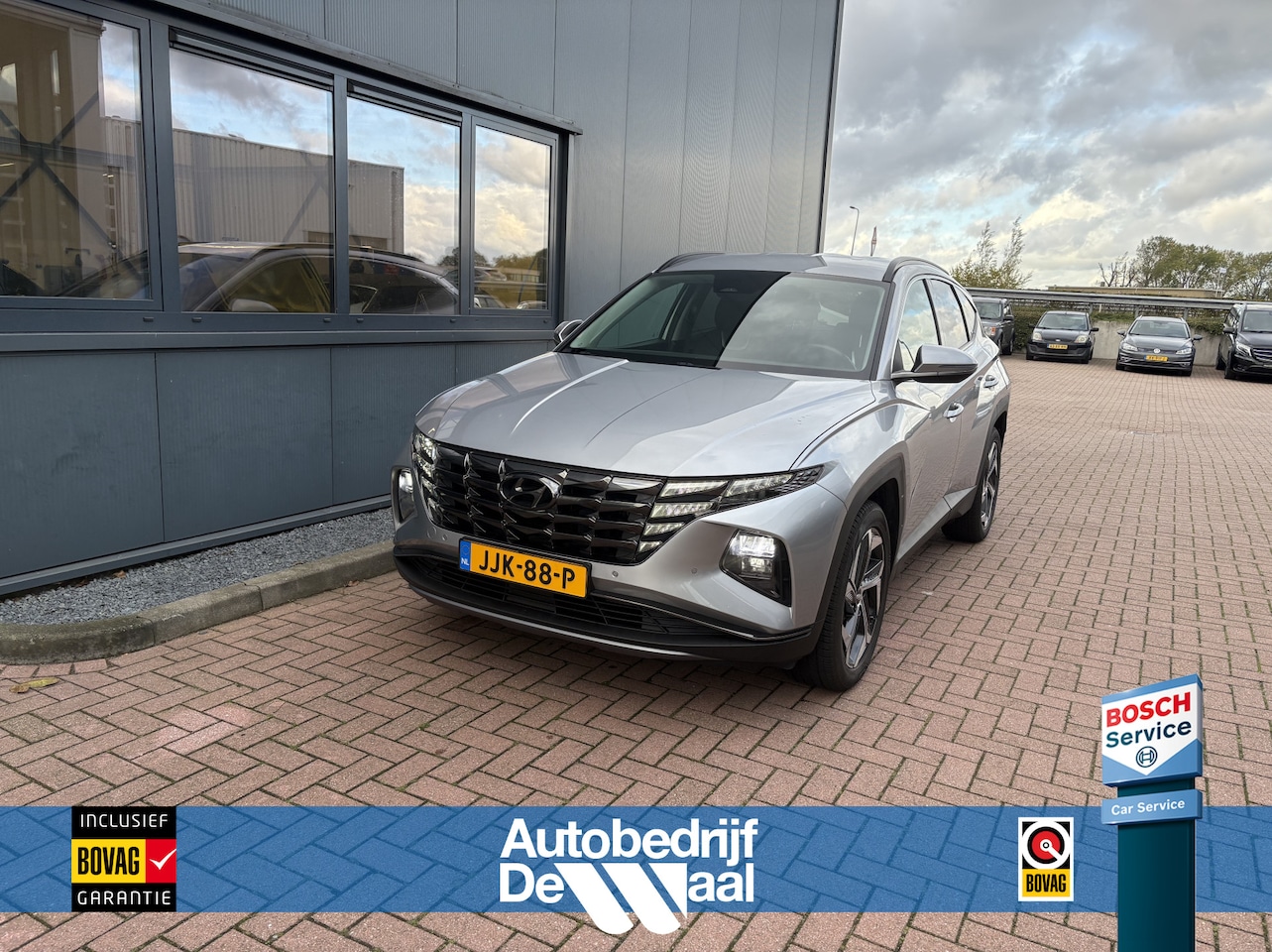Hyundai Tucson - 1.6 T-GDi 180pk HEV Comfort LEDER/KRELLAUDIO/KEYLESS/CAMERA/CARPLAY/19INCH - AutoWereld.nl
