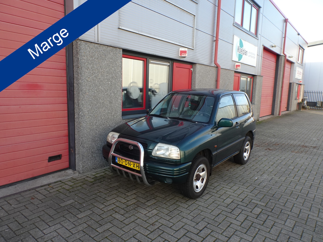 Suzuki Grand Vitara - 2.0 Metal Top 4 x 4 airco - AutoWereld.nl