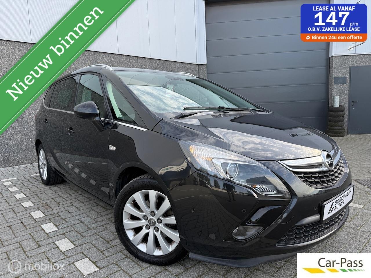 Opel Zafira Tourer - 1.4 Benzine 5 Zitplaatsen Trekhaak Camera - AutoWereld.nl