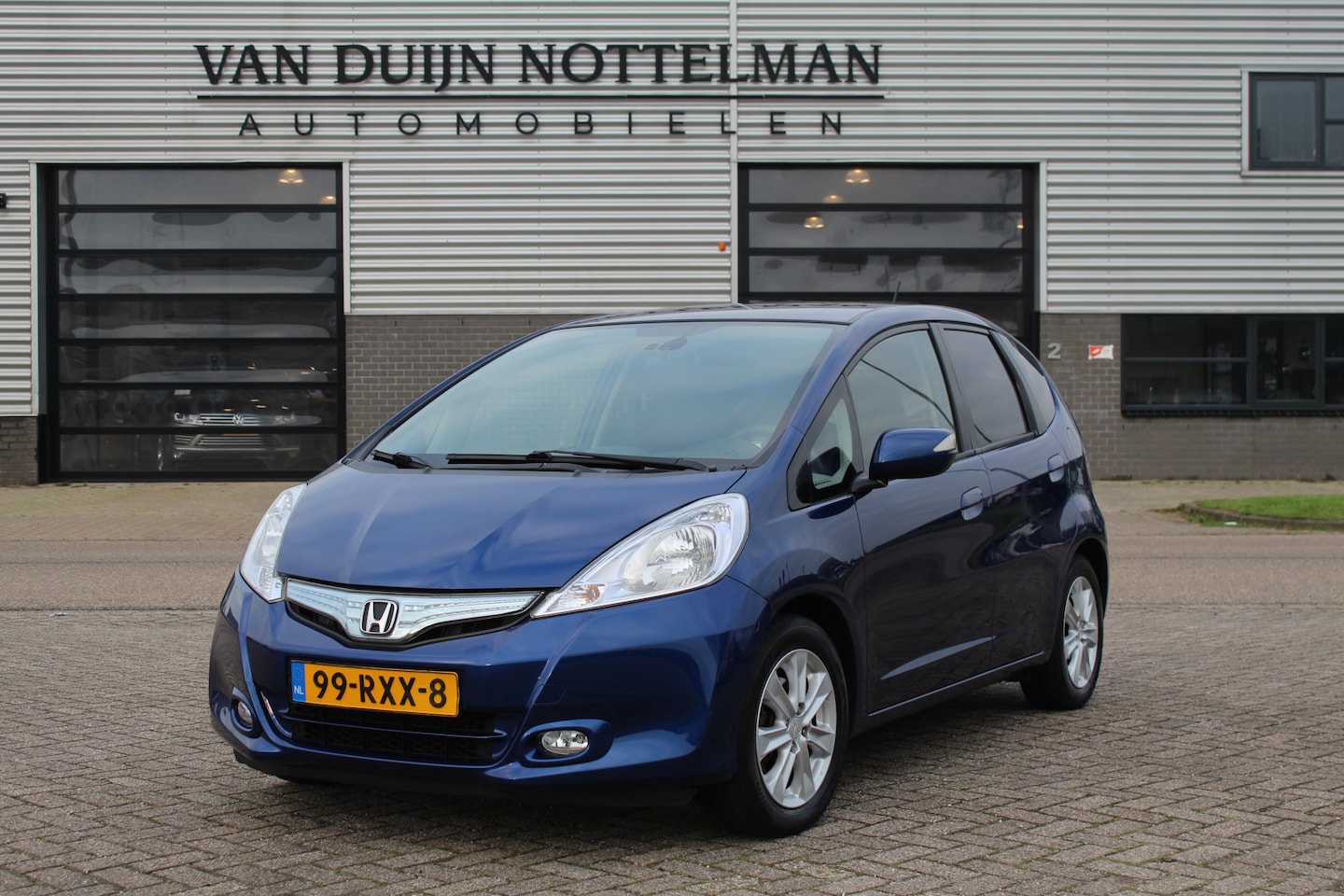 Honda Jazz - 1.4 Hybrid Business Mode + / Navigatie / Climate / Trekhaak / N.A.P. - AutoWereld.nl