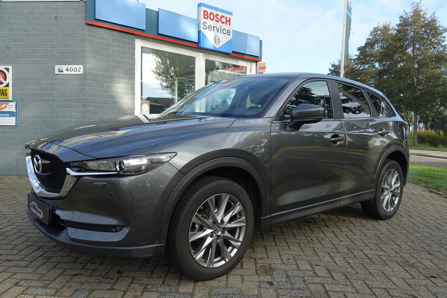 Mazda CX-5 - 2.5 SKYACTIV-G 194pk 2WD Aut Luxury | TREKHAAK | HUD | 360 CAM | CARPLAY - AutoWereld.nl