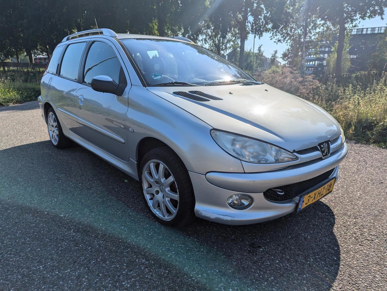 Peugeot 206 SW - 1.6-16V Quiksilver Airco Benzine Radio/CD - AutoWereld.nl