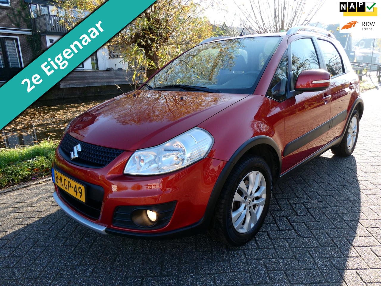 Suzuki SX4 - 1.6 4WD 120pk 2e eigenaar Clima Navi Trekhaak 1200kg Keyless - AutoWereld.nl