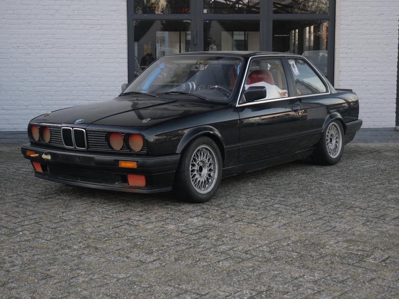 BMW 3-serie - 325i Circuit auto met kooi - AutoWereld.nl