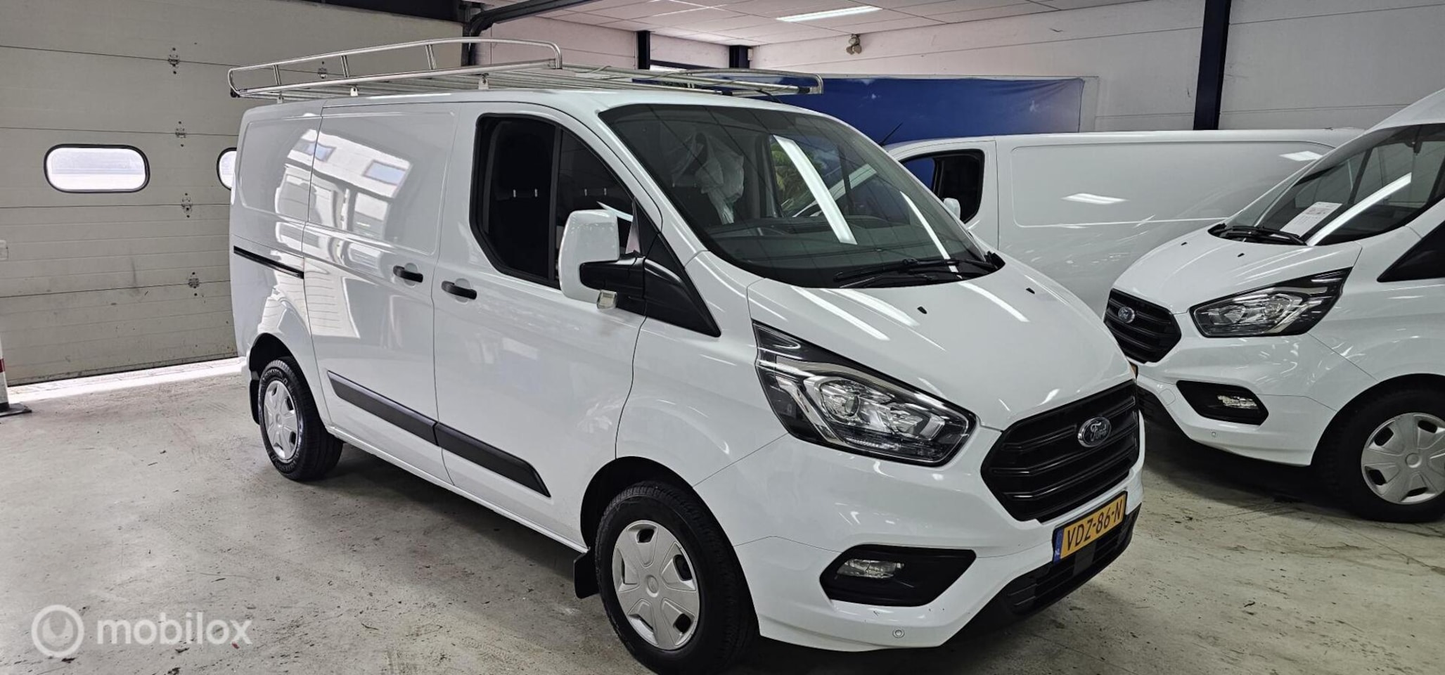Ford Transit Custom - 280 2.0 TDCI L1H1 Airco Cruise Imperiaal - AutoWereld.nl