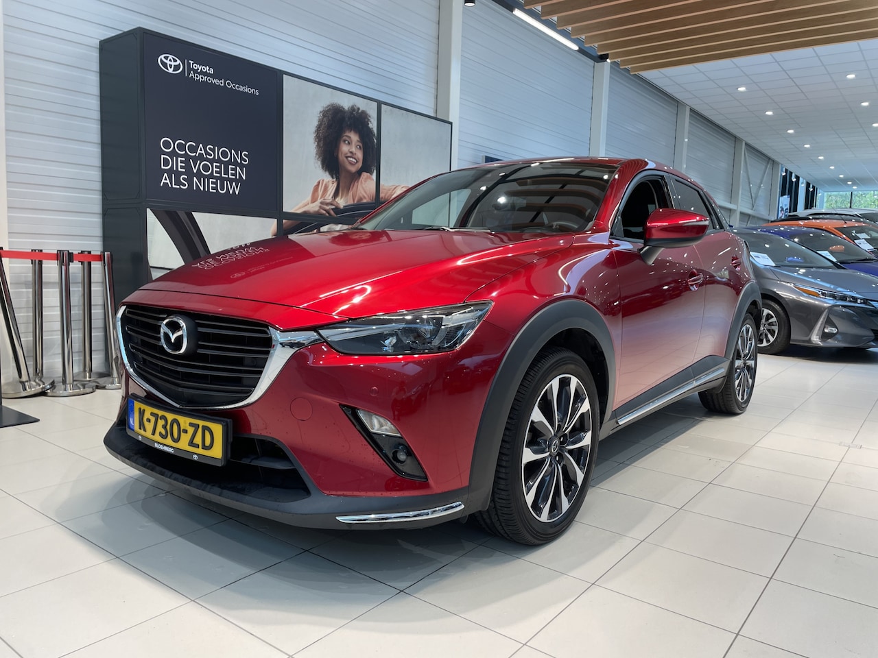 Mazda CX-3 - 2.0 SkyActiv-G 121 Luxury | Head up display | Fabrieksnavigatie | Parkeersensoren | - AutoWereld.nl