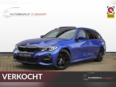 BMW 3-serie Touring - 320i M sport // Portimao Blue | BTW auto | Panoramadak | Trekhaak | Sfeerverlichting | Car