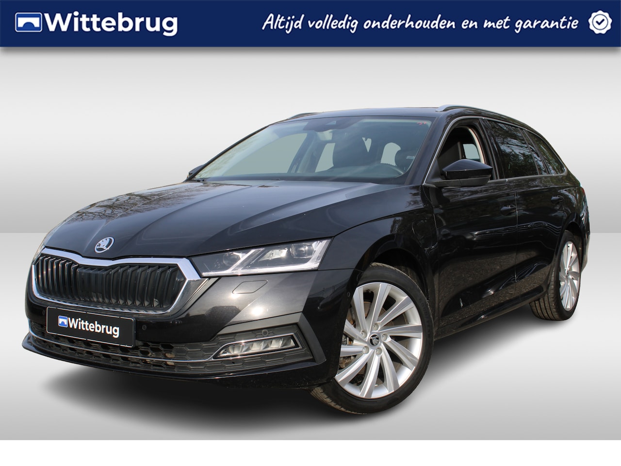 Skoda Octavia Combi - 1.4 TSI iV 204pk PHEV Style DSG AUTOMAAT / Panorama dak / Leder / Navigatie / LM 18 inch / - AutoWereld.nl