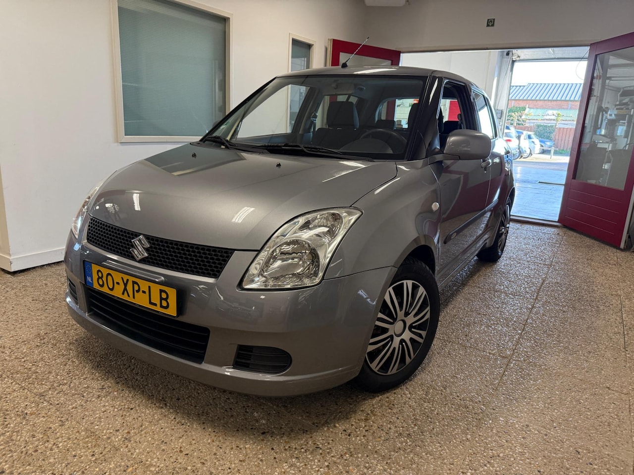 Suzuki Swift - 1.3 GLS 5-drs Airco | All Season banden - AutoWereld.nl