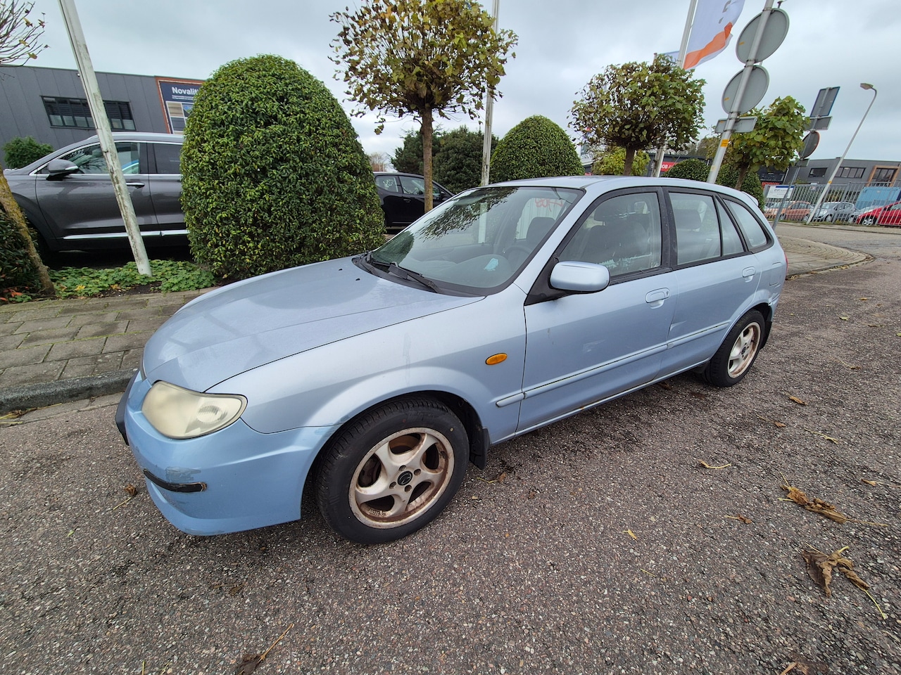 Mazda 323 Fastbreak - 1.6i Touring - AutoWereld.nl