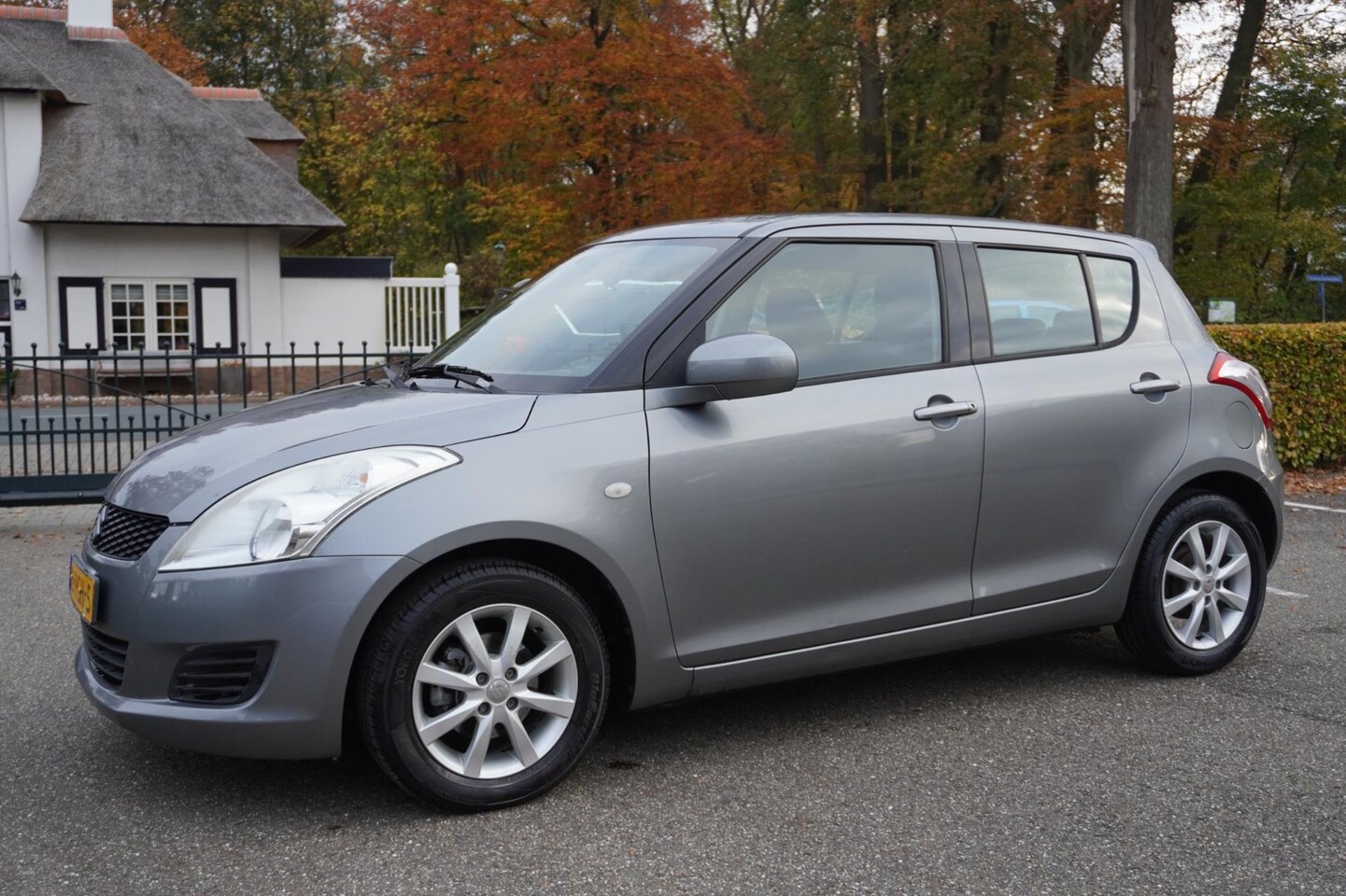Suzuki Swift - 1.2 Comfort EASSS 5Drs Airco Lm Velgen - AutoWereld.nl