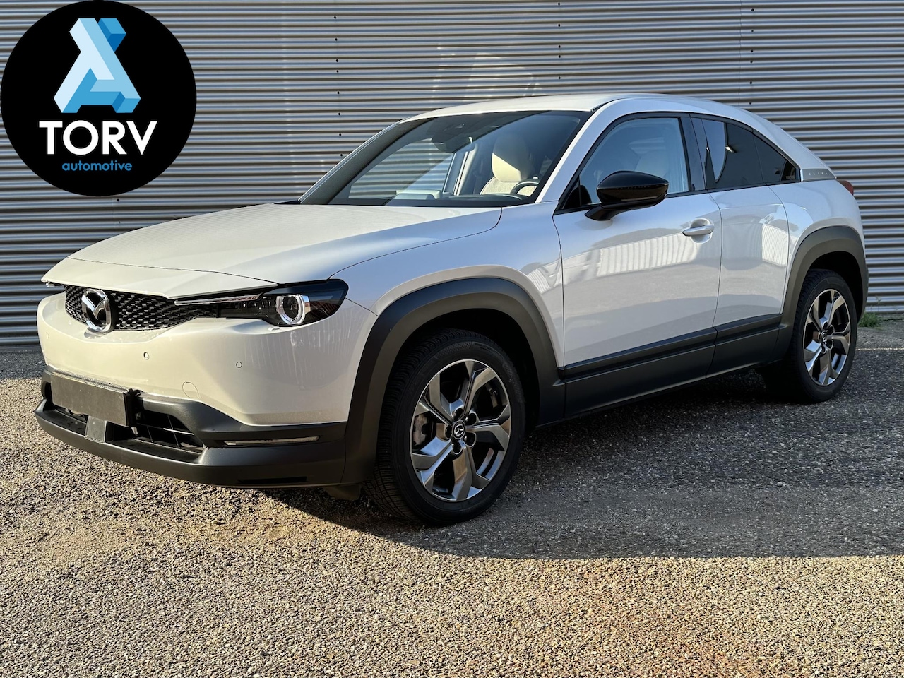 Mazda MX-30 - e-SkyActiv First Edition | Trekhaak | All Seasons | Dealer onderhouden | 2 laadkabels - AutoWereld.nl