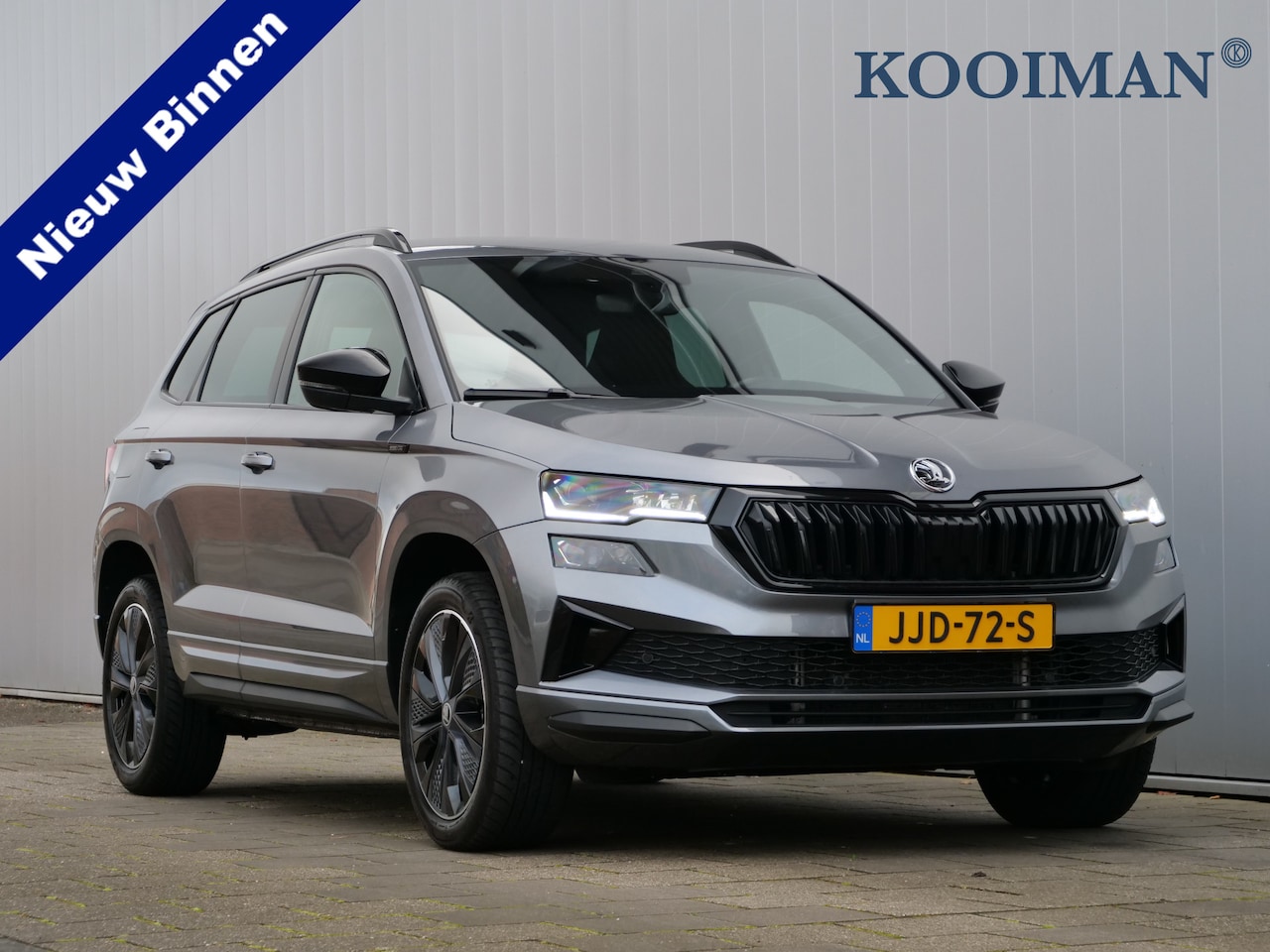 Skoda Karoq - 1.5 TSI ACT Sportline Business 150 Pk Automaat Navigatie / Camera / Apple Carplay / DAB - AutoWereld.nl