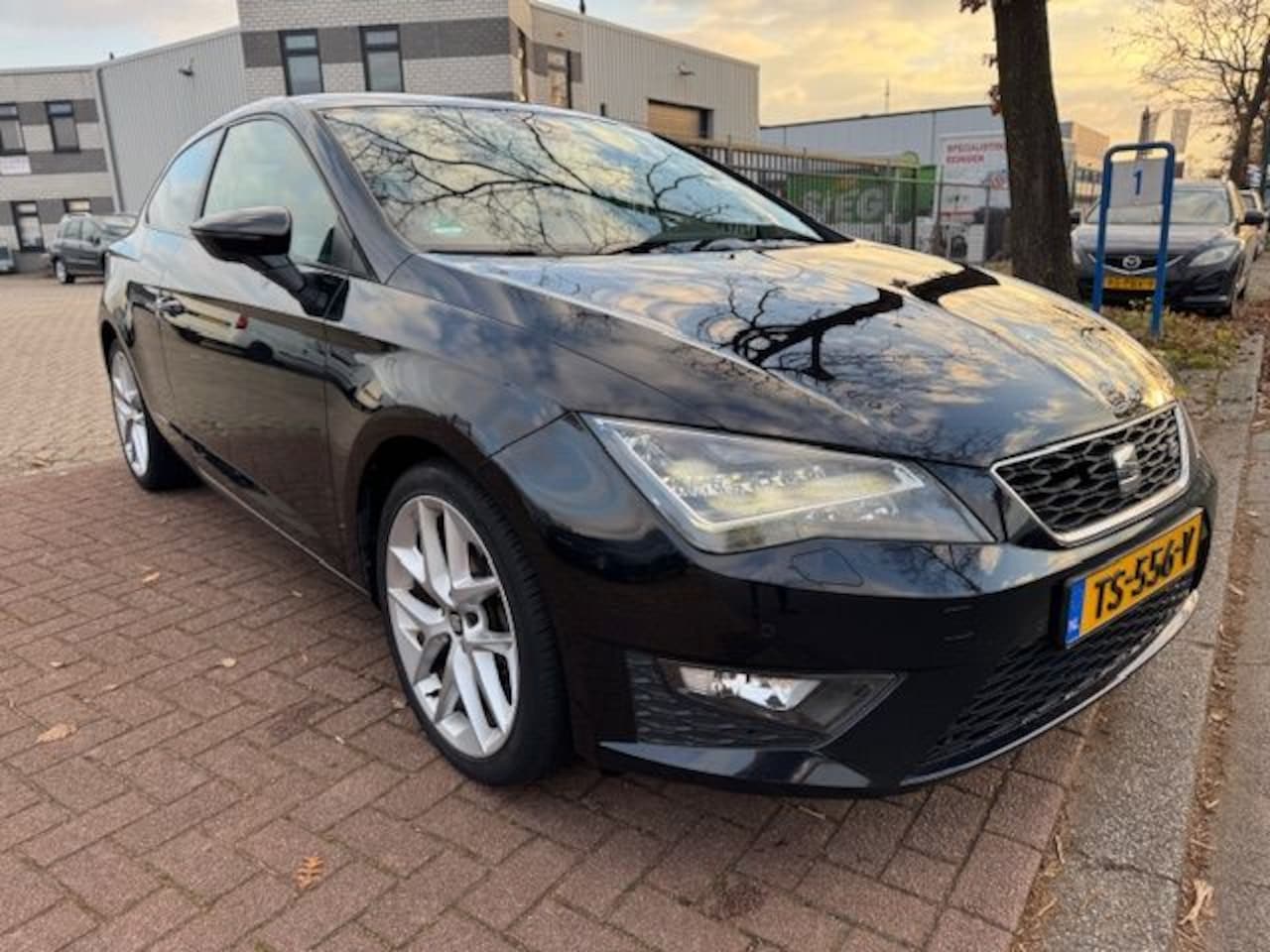 SEAT Leon SC - 1.4 TSI 140pk FR Business Airco/ECC,Half Leder,Navigatie,LED,18" Lm-velgen - AutoWereld.nl