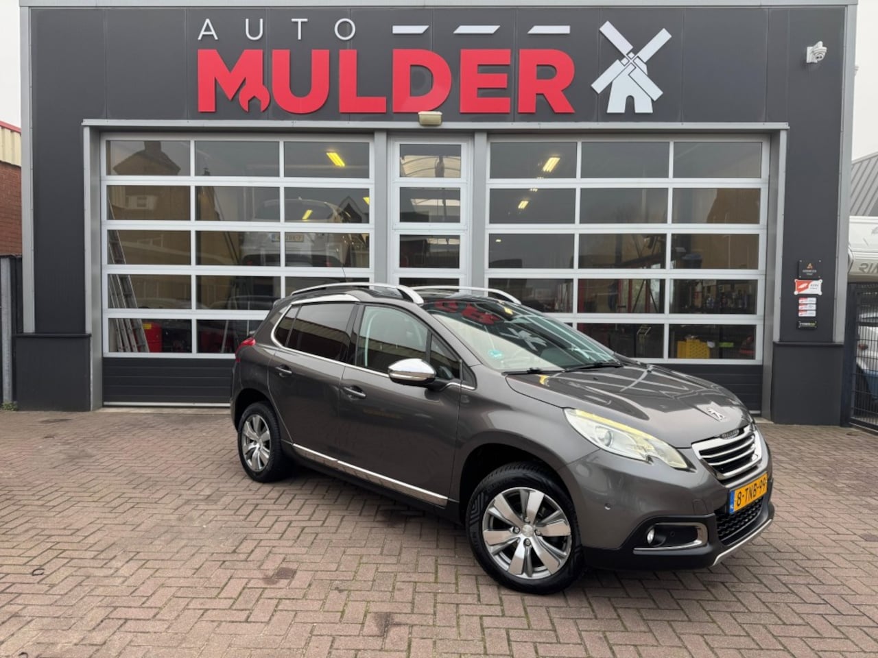 Peugeot 2008 - ALLURE 1.2 PURETECH / PDC / TREKHAAK / NAVI / CRUISECONTROL / PANODAK! - AutoWereld.nl