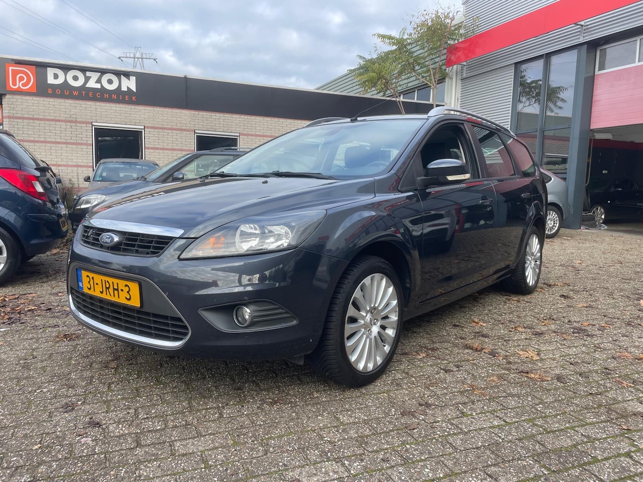 Ford Focus Wagon - 1.8 Titanium Flexi Fuel clima navi - AutoWereld.nl