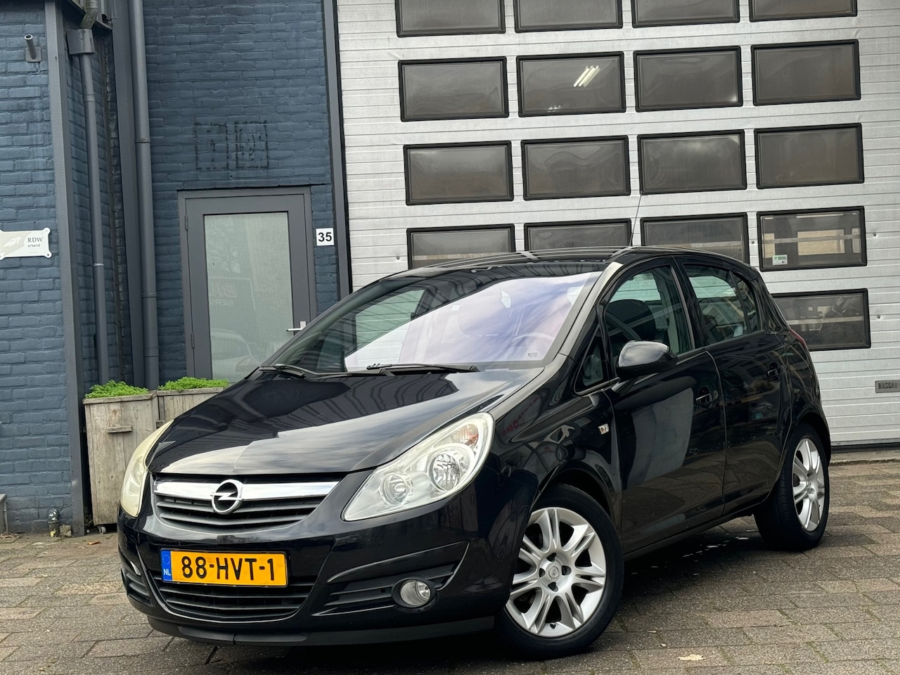 Opel Corsa - 1.4-16V Cosmo | Airco | Cruise | LMV | 5-DRS - AutoWereld.nl