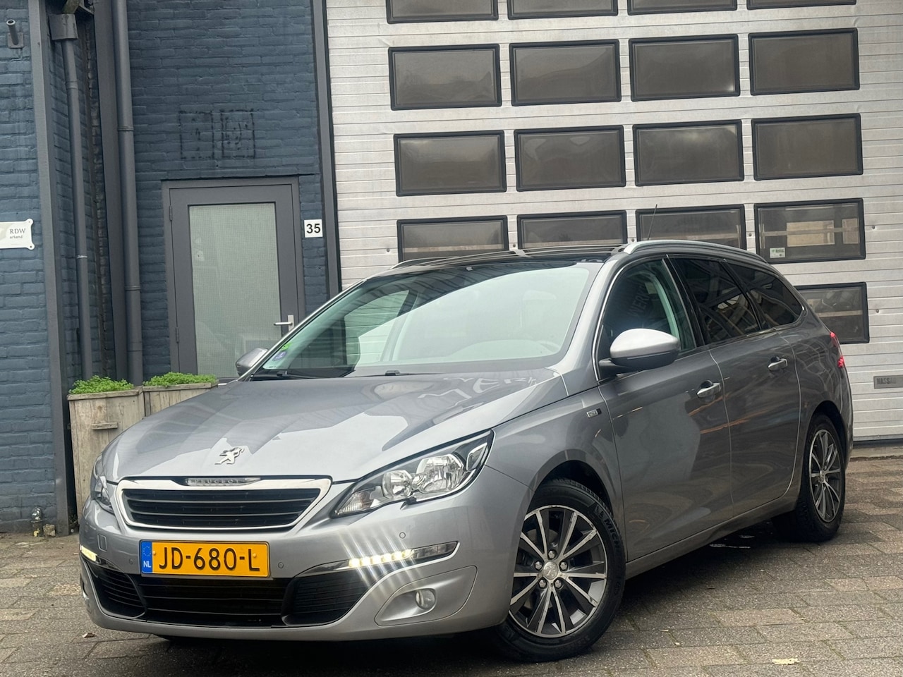 Peugeot 308 SW - 1.2 PureTech Style | Clima | Camera | Navi | N.A.P - AutoWereld.nl