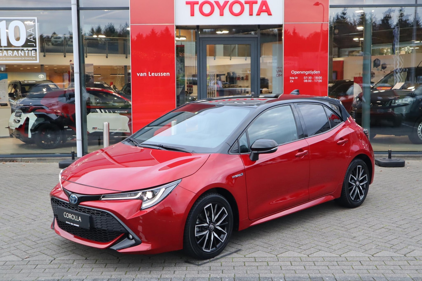 Toyota Corolla - 1.8 HYBRID STYLE 5-DEURS KEYLESS 17"LM-VELGEN PRIVACY-GLASS HALF-LEDER/STOELVERW. AD-CRUIS - AutoWereld.nl