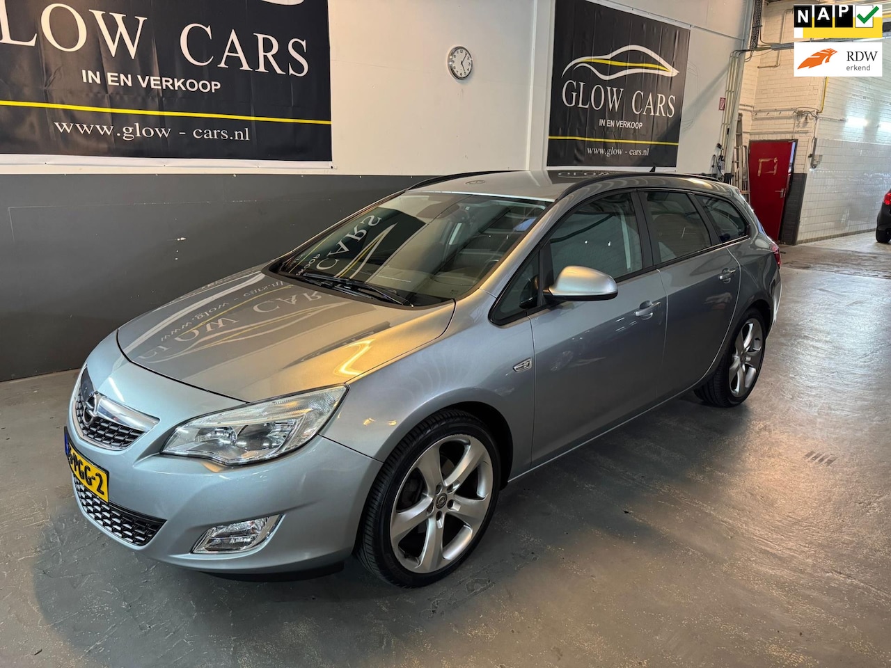 Opel Astra Sports Tourer - 1.6 Turbo Cosmo |AIRCO|CRUISE|NAVI|PDC|TREKHAAK| - AutoWereld.nl