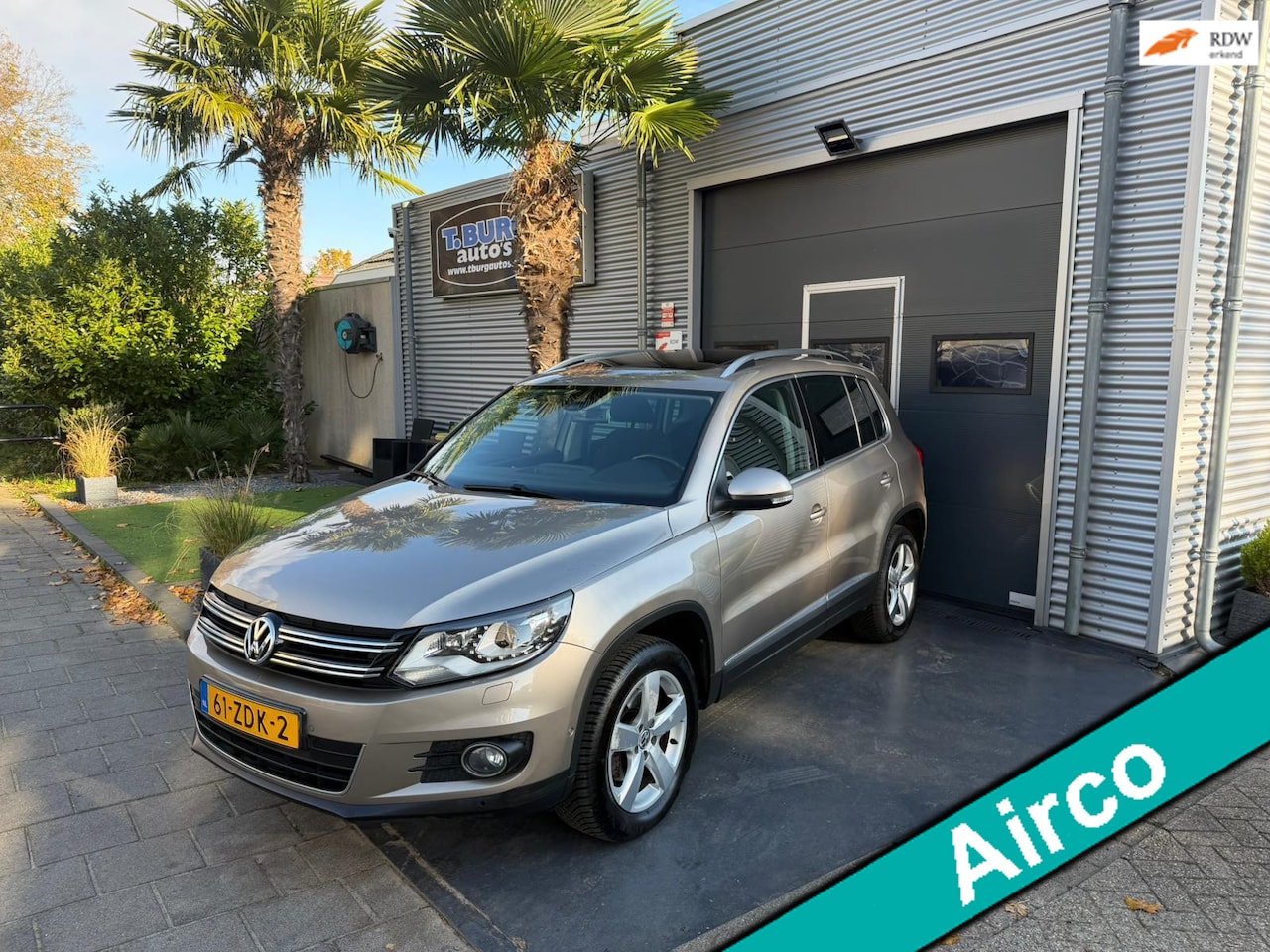 Volkswagen Tiguan - 1.4 TSI Sport&Style 4Motion Pan. Dak Xenon Led V+A 1e eigenaar - AutoWereld.nl