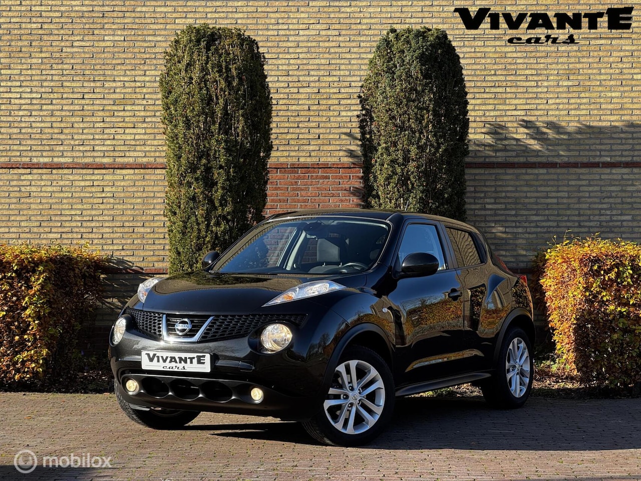 Nissan Juke - 1.6 Acenta Camera*Clima*Navi*Cruise - AutoWereld.nl