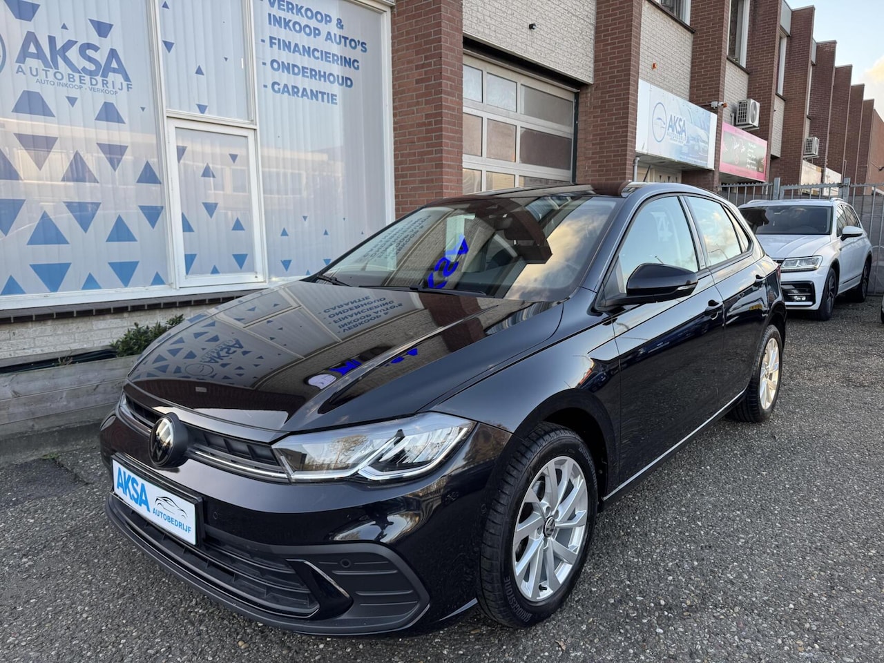 Volkswagen Polo - 1.0 TSI Life 95pk CarPlay LaneAssist Navi Front Assist Garantie - AutoWereld.nl