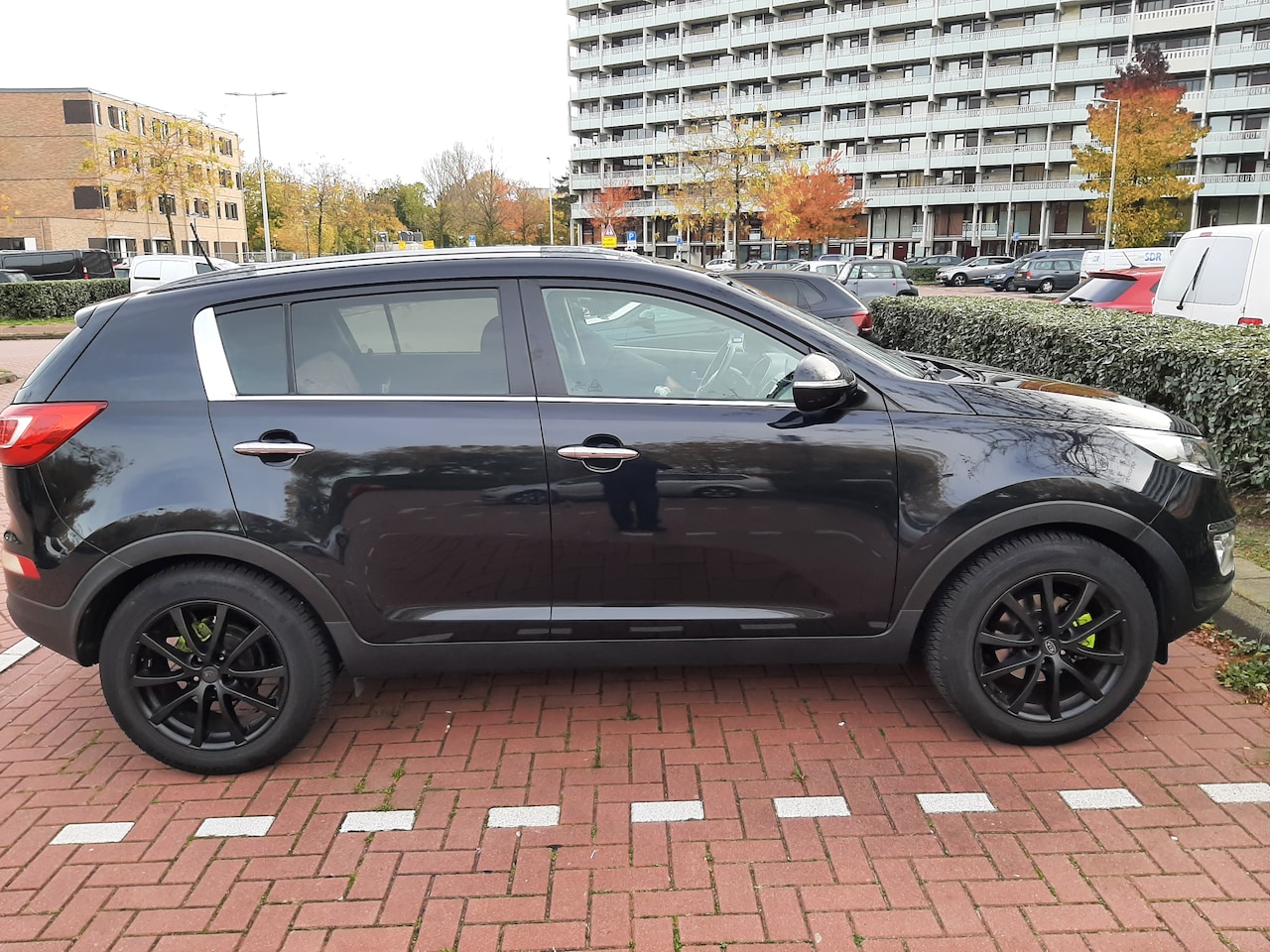 Kia Sportage - 1.6 GDI ISG X-clusive - AutoWereld.nl