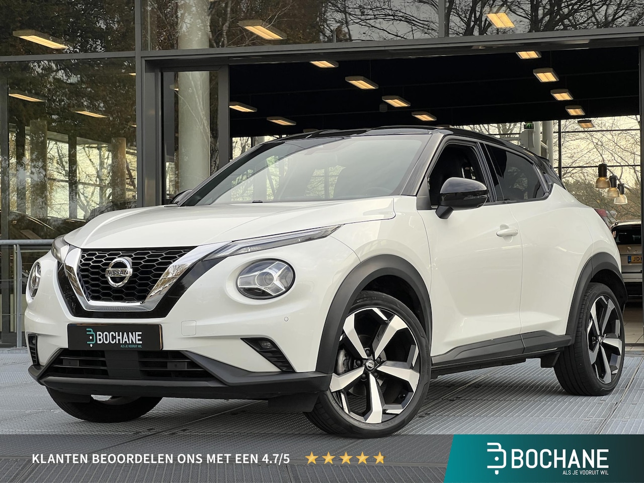 Nissan Juke - 1.0 DIG-T Tekna | BOSE | Adaptieve Cruise Control | 360 graden camera | Navigatie - AutoWereld.nl