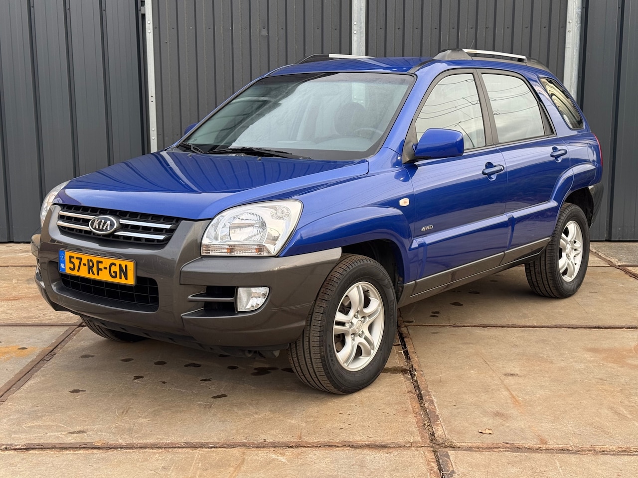 Kia Sportage - 2.7 V6 Adventure 4WD Automaat | Airco | Clima | Cruise - AutoWereld.nl