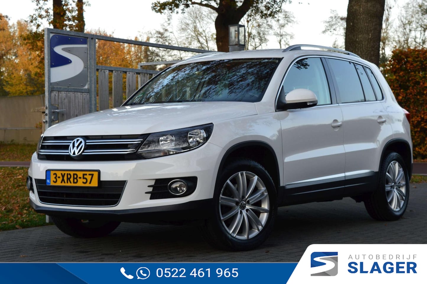 Volkswagen Tiguan - 2.0 TSI Sport&Style 4Motion - Navi|Trekhaak|Cruise|PDC - AutoWereld.nl