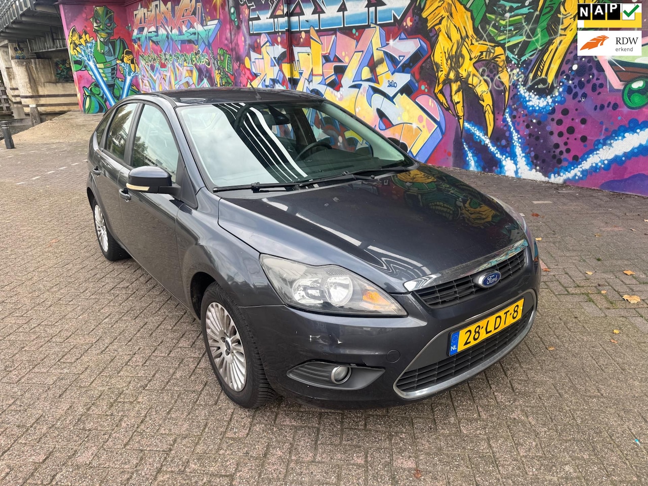 Ford Focus - 1.6 Titanium automaat sport velgen trekhaak airco bouwjaar 2010 met 216km - AutoWereld.nl