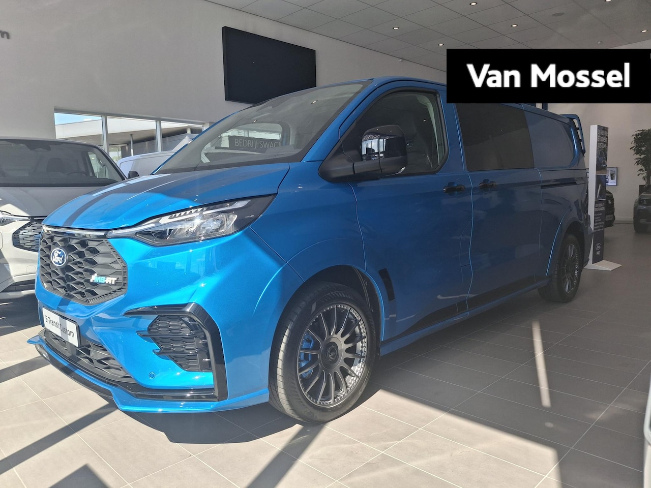 Ford Transit Custom - E-Transit 320 L2H1 MS-RT 65 kWh | NIEUW TE BESTELLEN | MS-RT SPORTSTOELEN, VLOERMATTEN EN - AutoWereld.nl