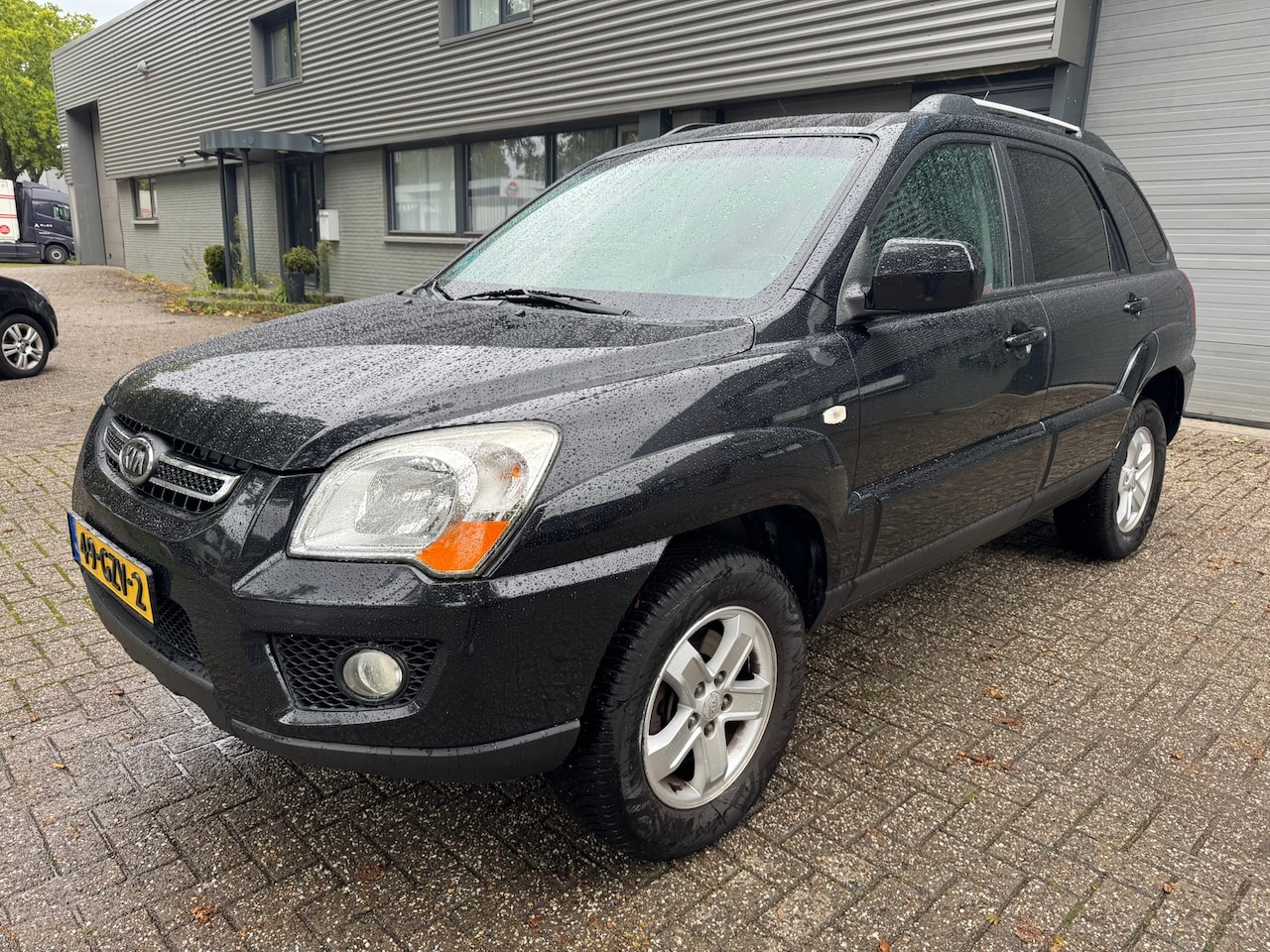 Kia Sportage - 2.0 CVVT X-tra 2.0 CVVT X-tra - AutoWereld.nl