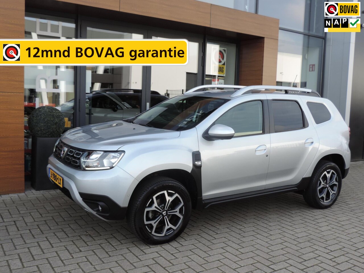 Dacia Duster - 1.3 TCe Prestige 38.000km | 360Cam | Trekh | Navi | Priv.glas | CarPlay | PDC | Cruise con - AutoWereld.nl